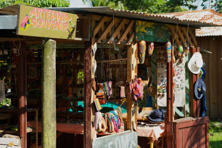 Tortuguero, Costa Rica - June 20, 2012: Souvenir shops in the town of Tortuguero, Costa Rica. Tortuguero is the base town for tourists to explore Tortuguero National Park.のeditorial素材