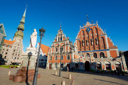 Riga, Latvia - August 03, 2009: City Hall square with House of the Blackheads, Roland statue and...
