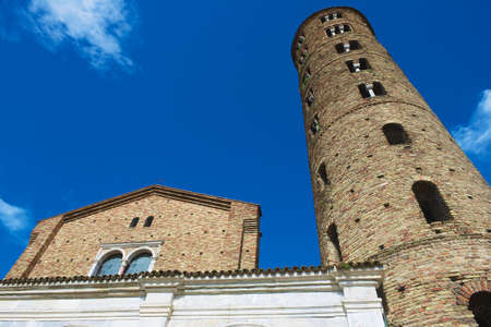 Ravenna, Italy - September 12, 2013: Facade and bell tower of the Church of Saint Apollinare Nuovo in Ravenna, Italy. Built in the 6th century, it houses beautiful byzantine mosaics of the 5th and 6th centuries. UNESCO World Heritage site.のeditorial素材
