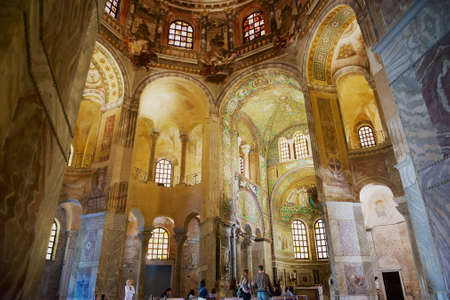 Ravenna, Italy - May 12, 2013: People visit rich decorated Basilica di San Vitale in Ravenna, Italy....