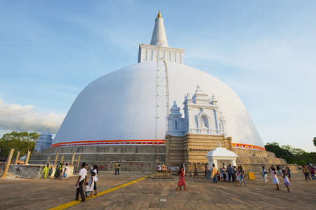 Anuradhapura, Sri Lanka - May 19, 2011: People visit Ruwanwelisaya stupa in Anuradhapura, Sri Lanka. Ruwanwelisaya is a sacred place for Buddhists and one of the largest stupas in the world.のeditorial素材