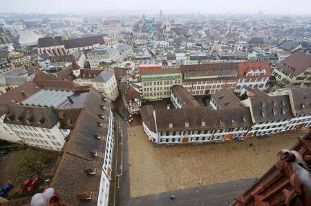 Basel, Switzerland - March 02, 2009: View to the historical buildings at the Munsterplatz square...