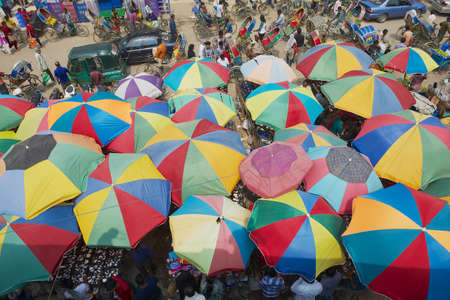 Dhaka, Bangladesh - February 22, 2014: People do shopping at the Old market in Dhaka, Bangladesh. Dhaka is one of the most overpopulated cities in the world.のeditorial素材