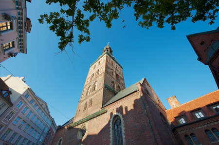 Riga, Latvia - August 03, 2009: Low angle view to the tower of Saint Peter church in the old town in...