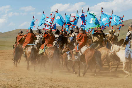 Ulaanbaatar, Mongolia - August 17, 2006: Mongolian horse riders take part in the traditional historical show of Genghis Khan era in Ulaanbaatar, Mongolia.のeditorial素材