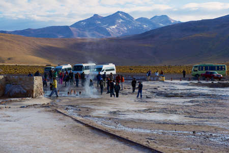 San Pedro De Atacama, Chile - October 25, 2013: Tourists visit El Tatio geysers circa San Pedro de Atacama, Chile.のeditorial素材