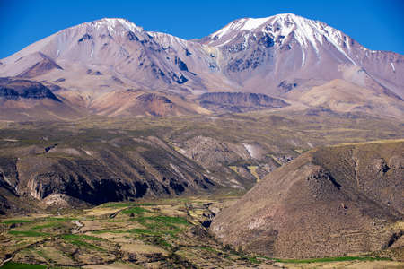 Taapaca volcanic complex in the Parinacota Province in the Arica-Parinacota Region in Chile.の写真素材
