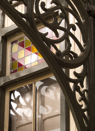 organic reflections on vintage railway station glass windowの写真素材