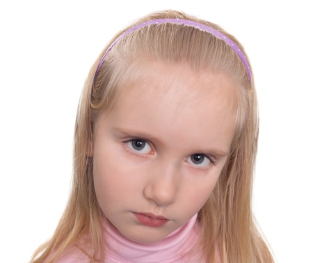 Portrait of unhappy girl isolated on white