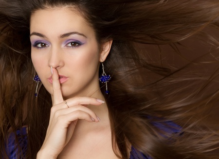 Beautiful Woman. Amazing Brunette with flying hair.の写真素材