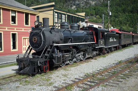 Skagway, AK, June 11, 2015 - A White Pass and Yukon Railway train arrives in Skagway, Alaska, a...