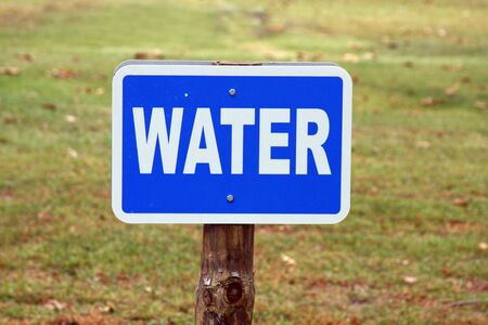 information sign for water in an outside parkの写真素材