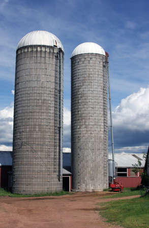 twin silos on traditional  Wisconsin  dairy farmの写真素材