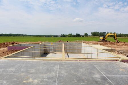 New poured basement foundation ready for a House
