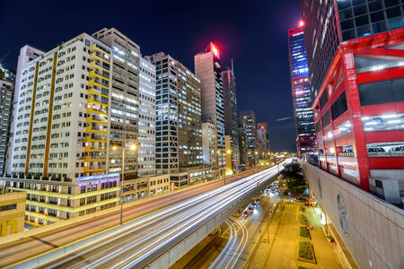 HONG KONG - December 02, 2013  Night traffic with long shutter at Sheung Wan Car Park  Hong Kong is a 24 hours living city のeditorial素材