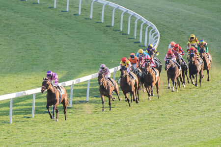 Hong Kong, China - February 2, 2014  Horse racing in Shatian racing field of Hongkong jockey club on February 2, 2014 in Hong Kong のeditorial素材