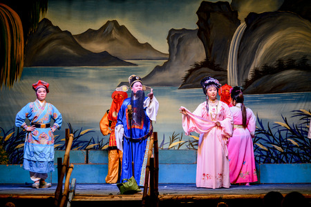 Hong Kong, China - August 18, 2014   Actors performing traditional Chinese opera on the ghost festival のeditorial素材