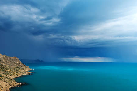 Thunderstorm and rain are coming to the sea coast of Crimeaの写真素材