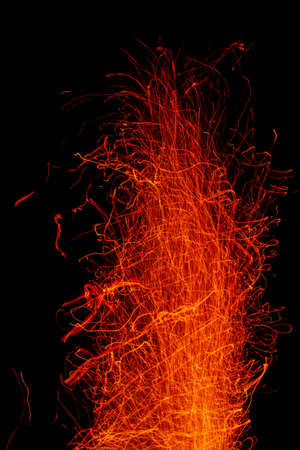 Fire sparks on a black backgroundの写真素材