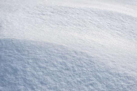 Abstract snow texture with selective focus and glittering bokehの写真素材