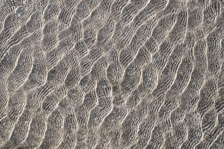 Abstract texture of water ripples top viewの写真素材