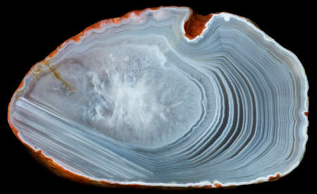 Slise of agate geode with quartz in the center on black. Russia, Kemerovo regionの写真素材