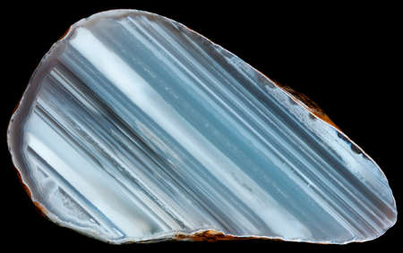 Slice of white parallel-layered agate geode on black. Russia, Kemerovo regionの写真素材