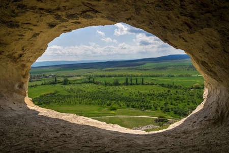 View from the rounded grotto on the rural valleyの写真素材