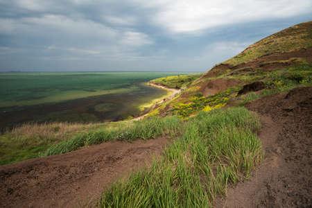 Wild deserted coast of the Azov sea in Crimeaの写真素材