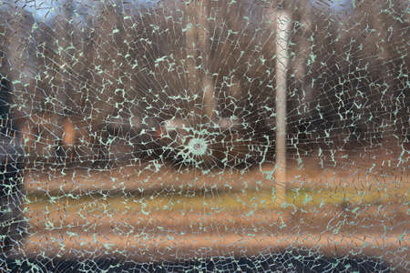 Texture of broken glass with city bokeh backgroundの写真素材