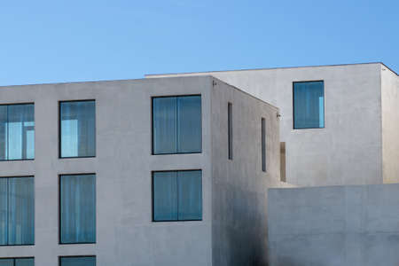 A fragment of white unfinished residential buildings in a modern minimalistic styleの写真素材
