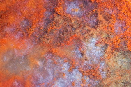 Full-screen stone texture. Close-up view of natural red jasper with blue chalcedony.の写真素材