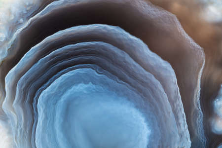 Full-screen stone texture. Fragment of blue layered agate.の写真素材