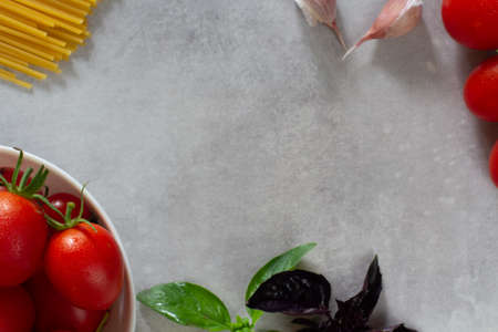 Ingredients for pasta with tomatoesの写真素材