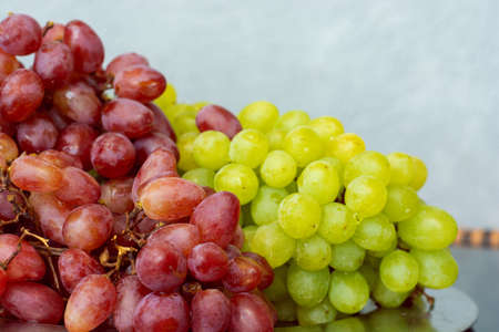 Bunch of red and green organic grapesの写真素材