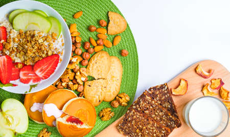 Healthy Breakfast Top View. Cereal with Milk and Strawberry on Wooden Table. Rustic Cover Menu. Place for Text.の写真素材