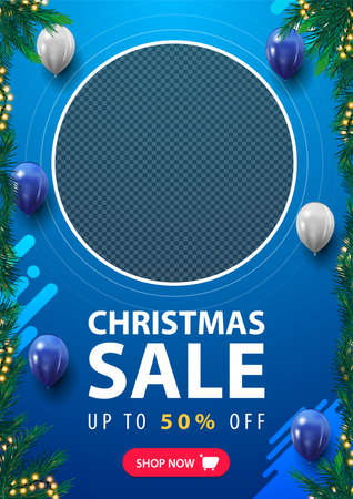 Christmas sale, vertical blue discount template with place for your photo, frame made of Christmas tree branches, button and flying balloonsのイラスト素材