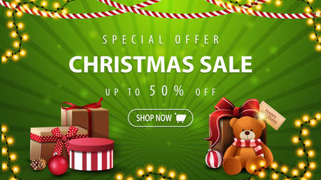 Special offer, Christmas sale, up to 50 off, beautiful green discount banner with garlands, present and Teddy bearのイラスト素材