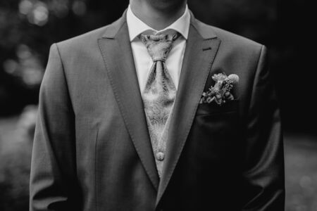 Groom wearing a tie, close upの写真素材