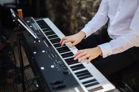 Musician playing the keyboardの写真素材