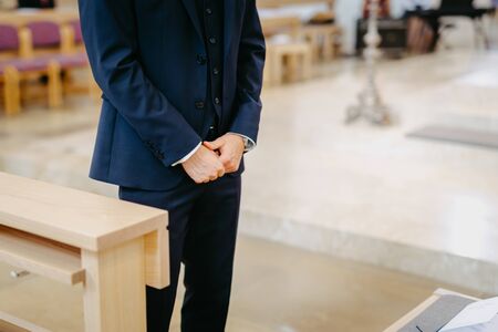 Groom waiting for the bride hands close upの写真素材