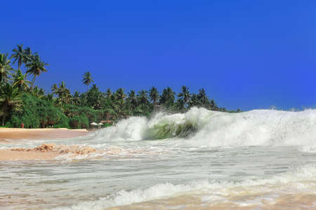 Beautiful waves by the shore of the islandの写真素材