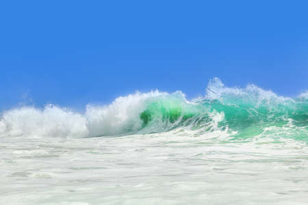 Beautiful waves by the shore of the islandの写真素材