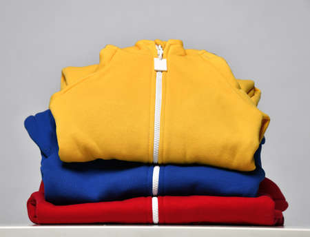 Fabric children sportswear stack, bodysuit store assortmentの写真素材