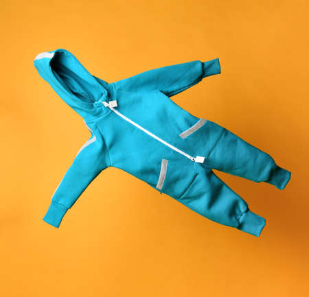 Fabric baby fleece bodysuit store assortment on tableの写真素材