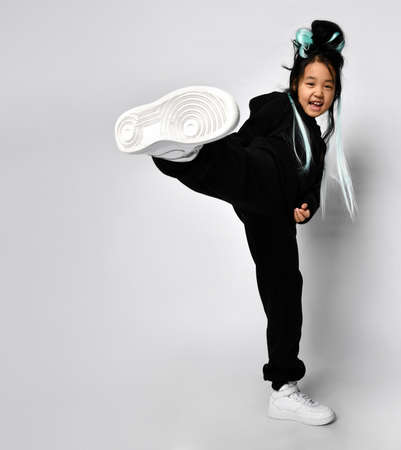 Attractive young korean woman wearing black hoodieの写真素材