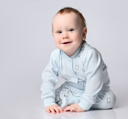 Baby boy posing for his first portrait