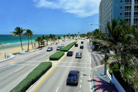 Sunrise Beach in Ft Lauderdale with palm trees and beach entry feature のeditorial素材