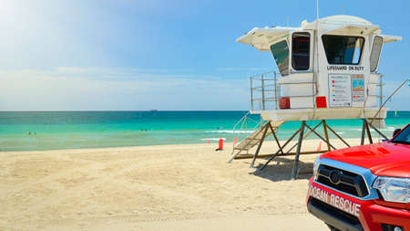 Sunrise Beach in Ft Lauderdale with palm trees and beach entry feature のeditorial素材