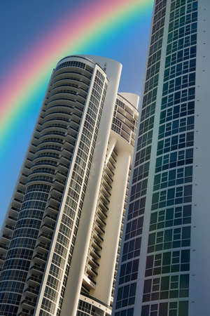beautiful rainbow and a tropical blue sky over miami south beach condos の写真素材